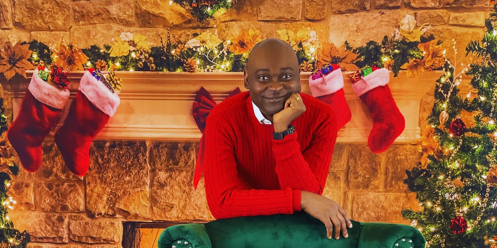 Yemi Alafifuni at a decorated fireplace, from the Home shoot